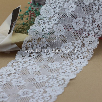 Jacquard lace warp knitting machine